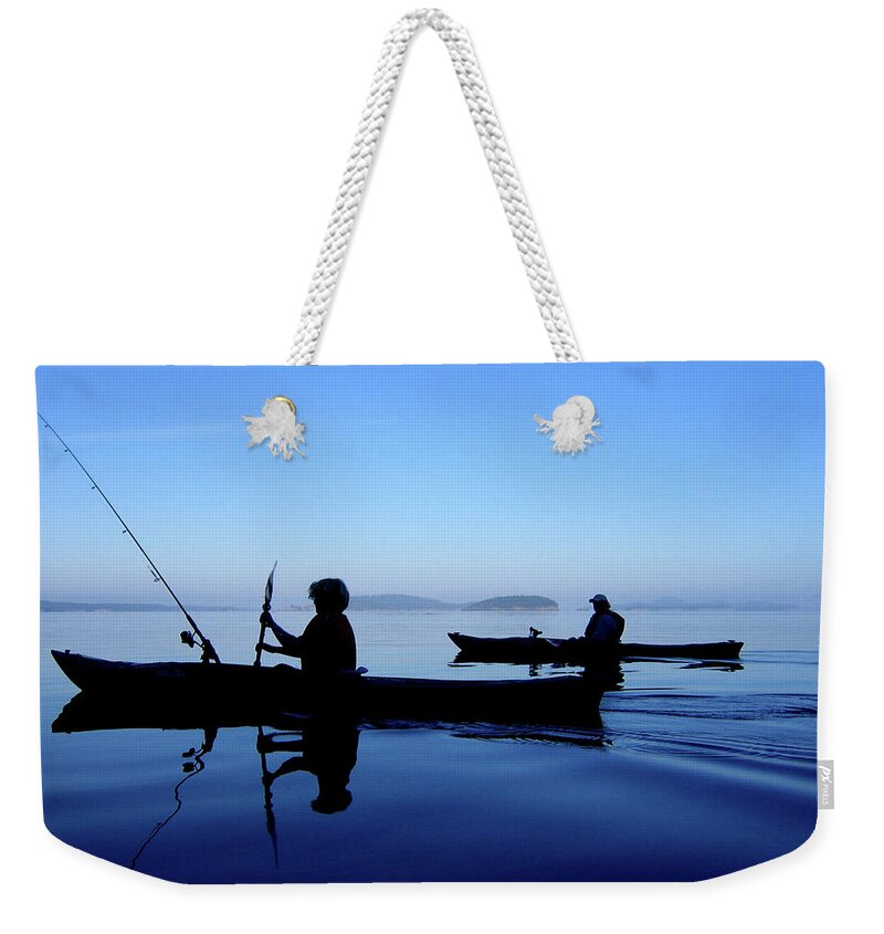 Kayakers Weekender Tote Bag featuring the photograph On the Deep Blue Sea by Lorraine Devon Wilke
