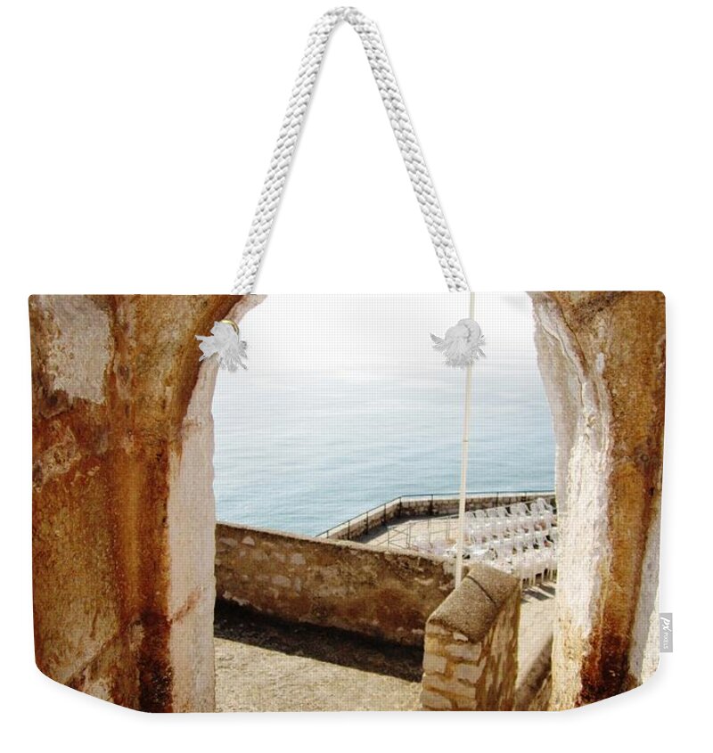 Peniscola Weekender Tote Bag featuring the photograph Peniscola Castle Arched Open Doorway Sea View II At the Mediterranean in Spain by John Shiron