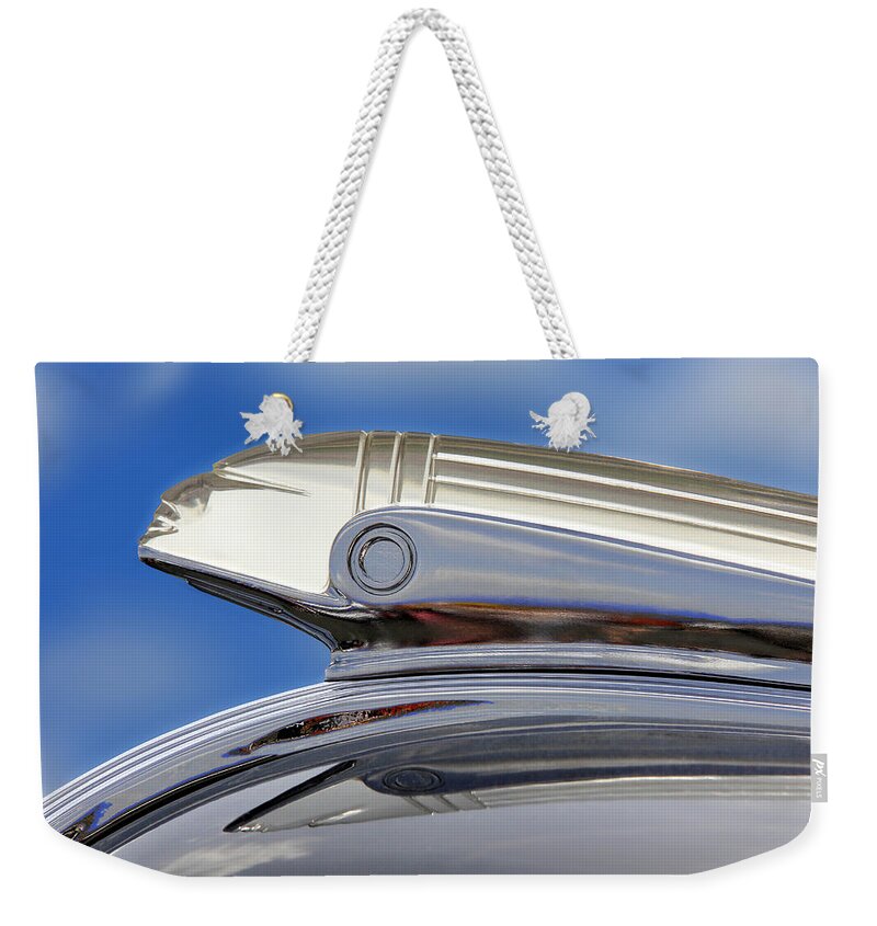 Pontiac Weekender Tote Bag featuring the photograph Pontiac Hood Ornament by Mike McGlothlen