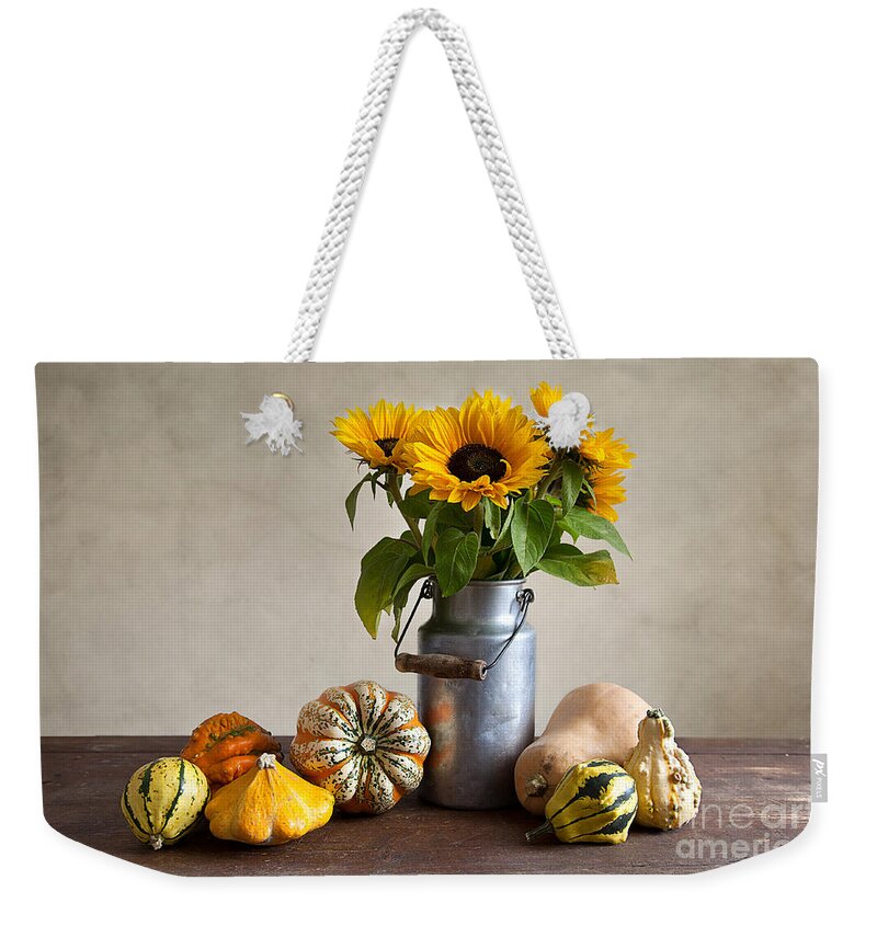 Autumn Weekender Tote Bag featuring the photograph Pumpkins and Sunflowers by Nailia Schwarz