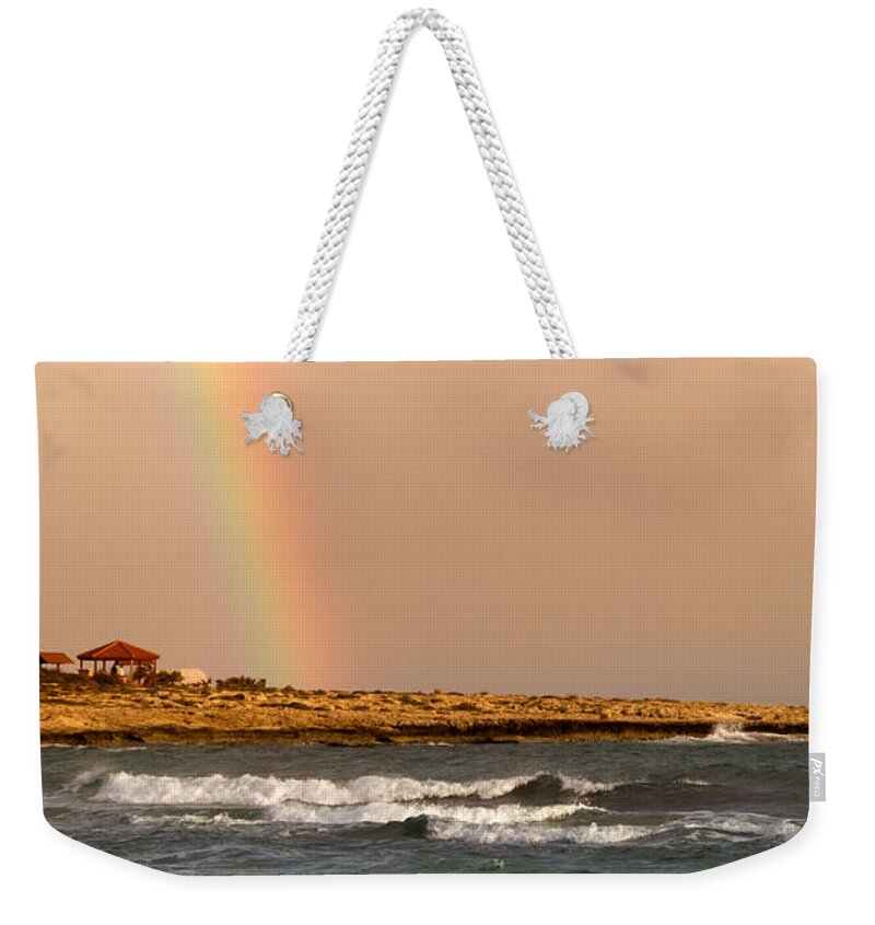 Background Weekender Tote Bag featuring the photograph Rainbow By The Sea by Stelios Kleanthous