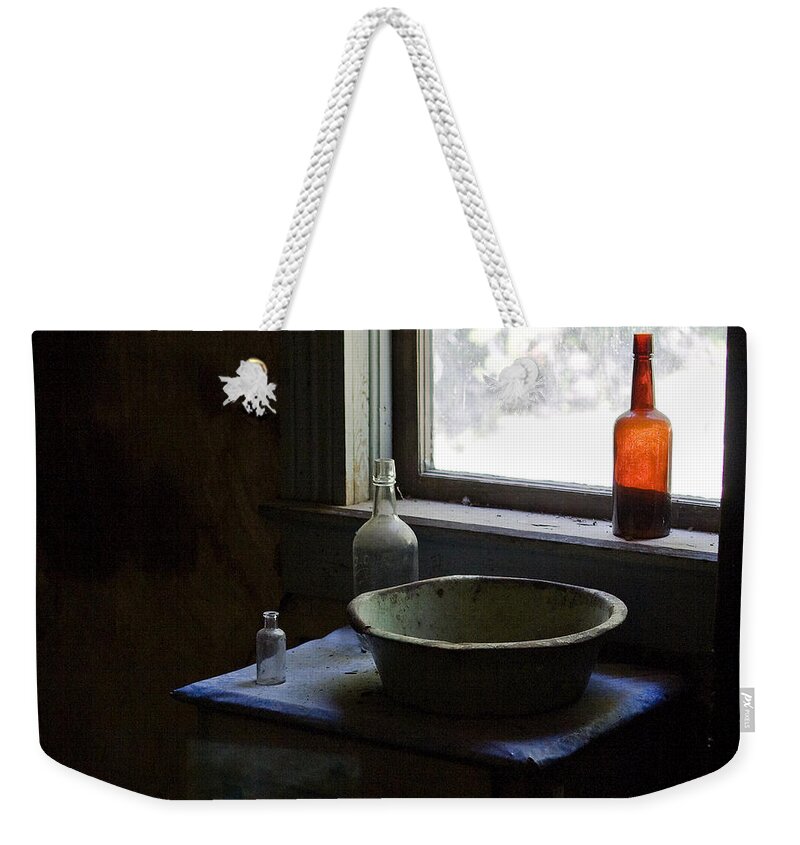 Red Bottle Weekender Tote Bag featuring the photograph Red Bottle Night Stand by Lorraine Devon Wilke