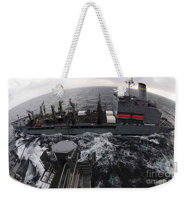 Uss Ronald Reagan Weekender Tote Bag featuring the photograph Replenishment At Sea Between Usns by Stocktrek Images