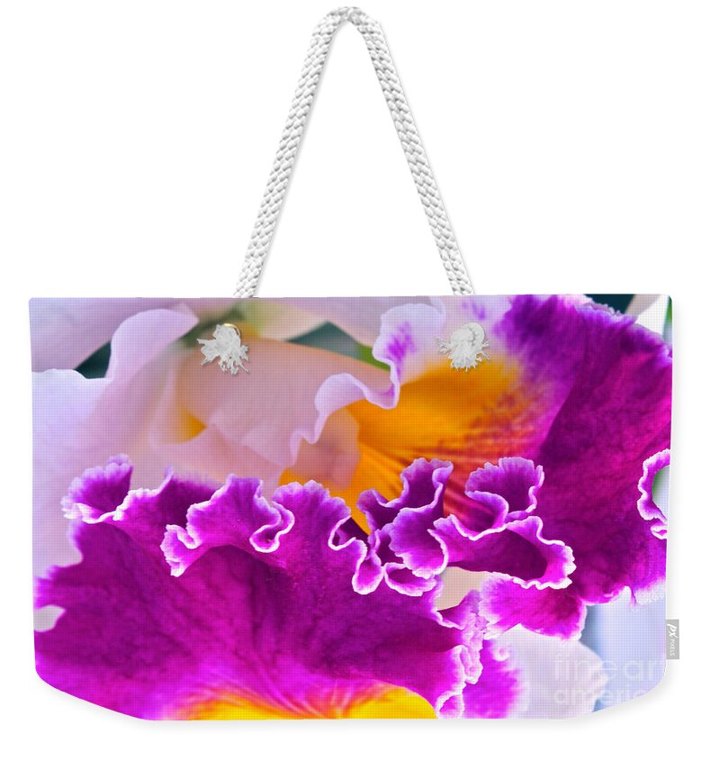 Orchid Macro Weekender Tote Bag featuring the photograph Ripples Ruffles Frills Flutes by Byron Varvarigos