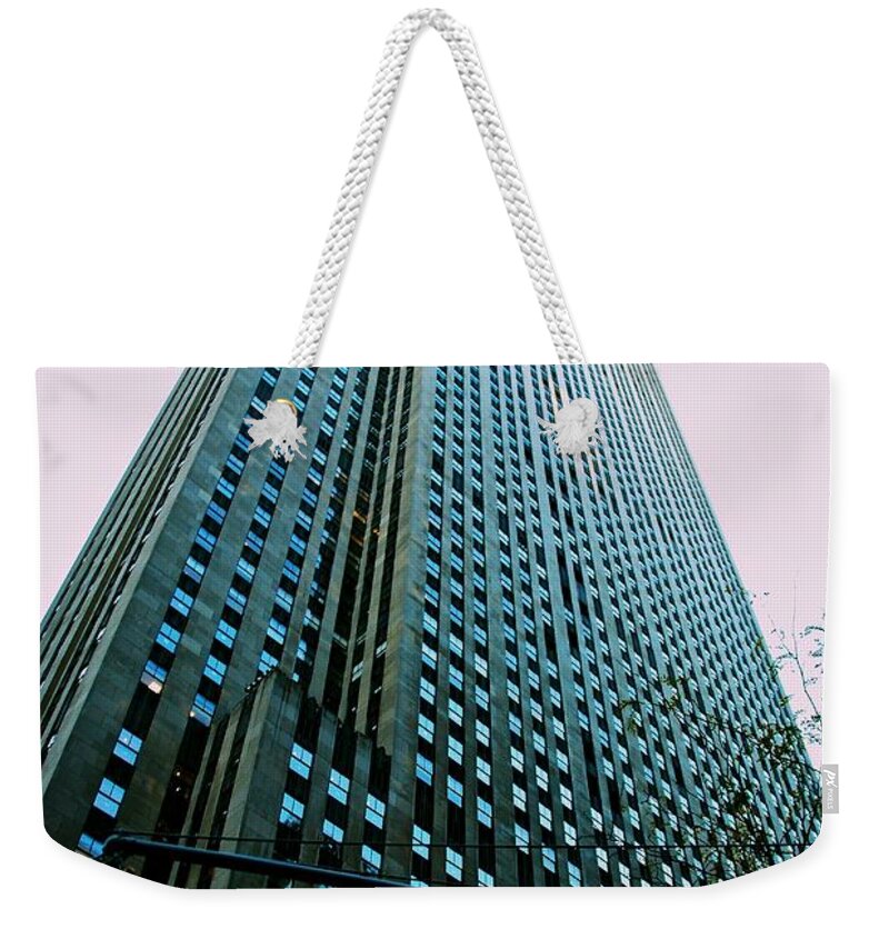 New York Weekender Tote Bag featuring the photograph Rockefeller Center by Eric Tressler