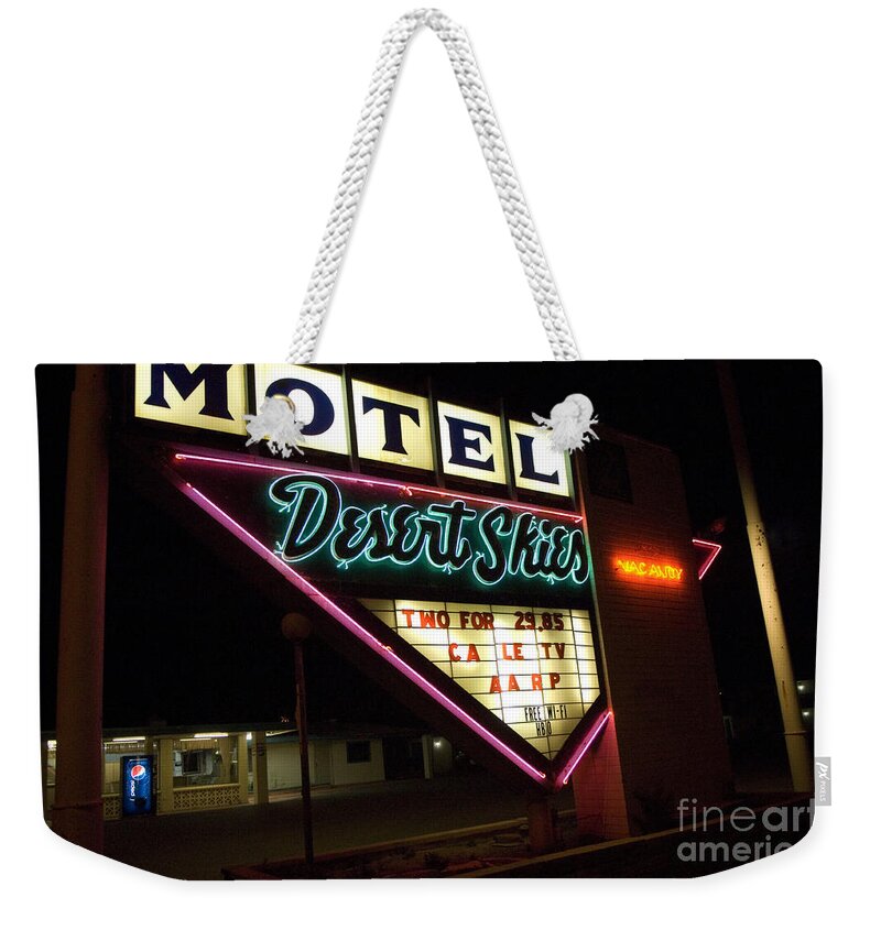 Route 66 Weekender Tote Bag featuring the photograph Route 66 Desrt Skies Motel Neon by Bob Christopher