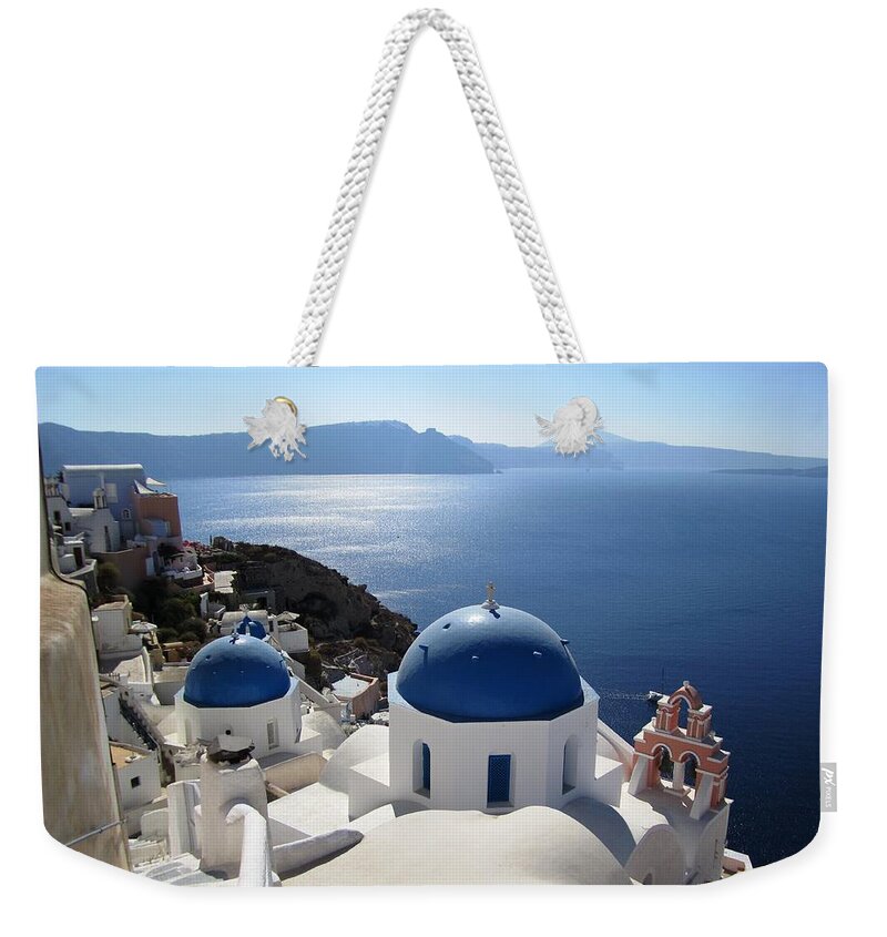 Santorini Weekender Tote Bag featuring the photograph Santorini Blue Domes Greek Isle Greece by John Shiron