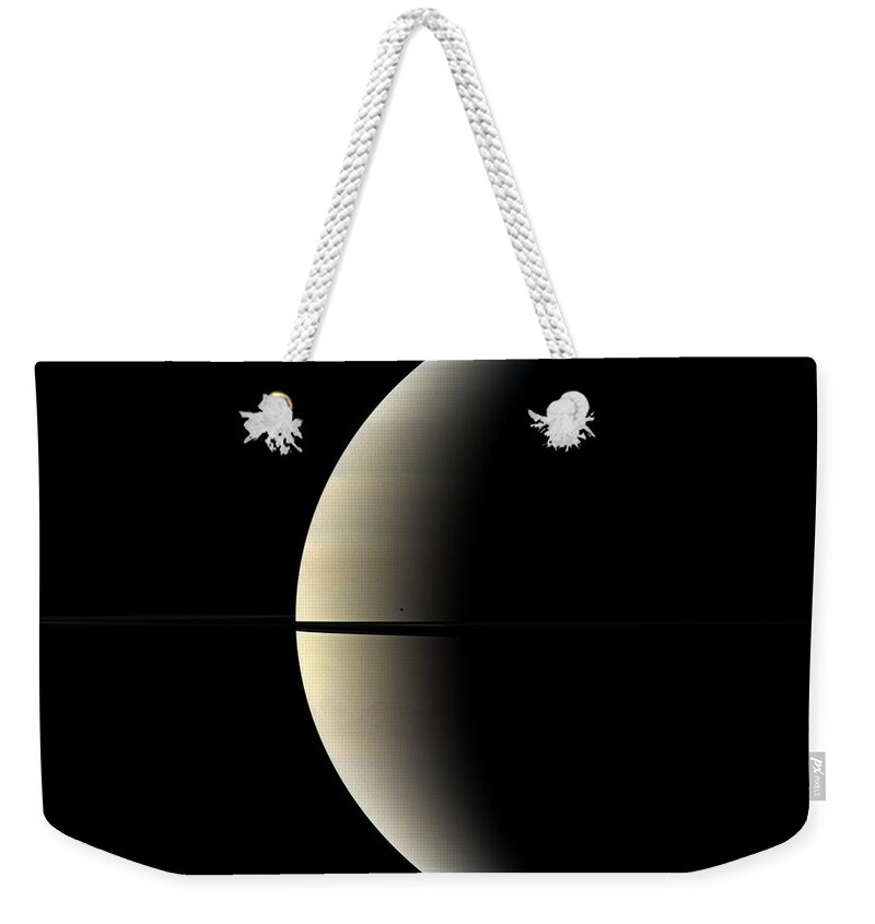 Saturn Weekender Tote Bag featuring the photograph Saturn And Its Moon Mimas by NASA/Science Source