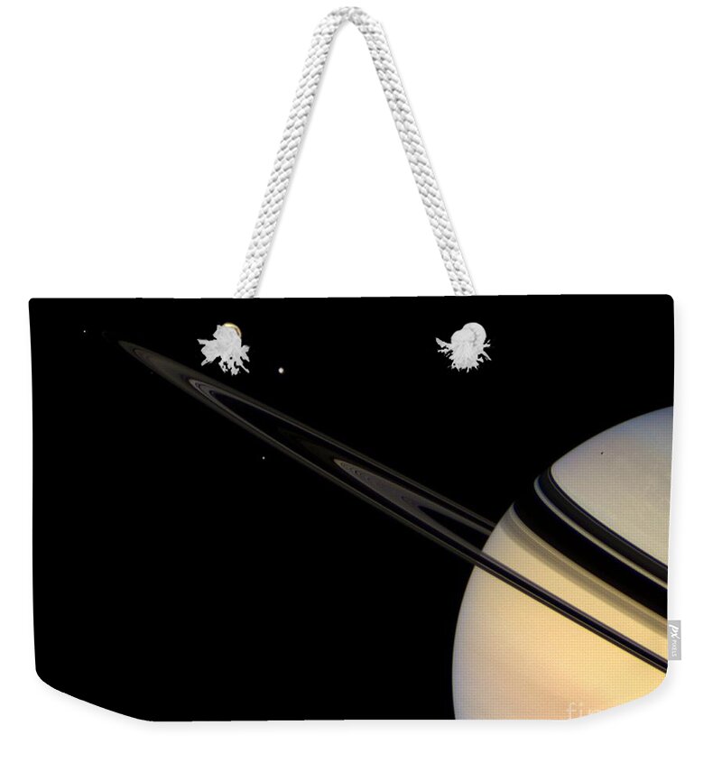 Saturn Weekender Tote Bag featuring the photograph Saturn And Its Moons by NASA/Science Source