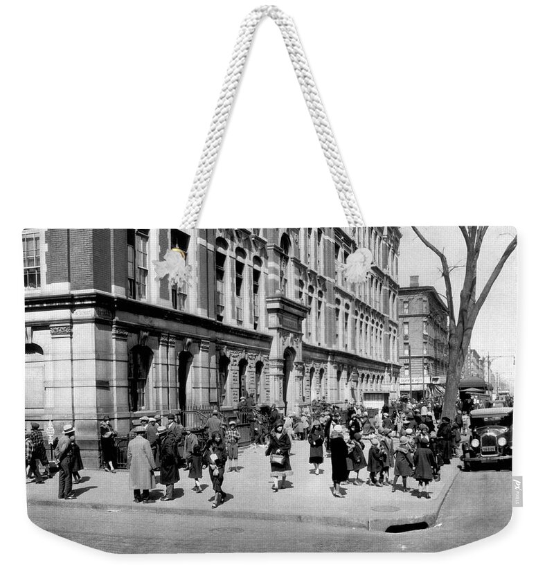 1920's Weekender Tote Bag featuring the photograph School's Out In Harlem by Underwood Archives