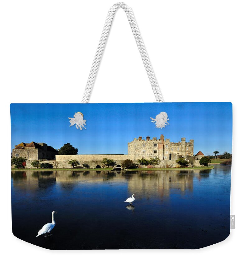 Castle Weekender Tote Bag featuring the photograph Skating Swans by Bel Menpes