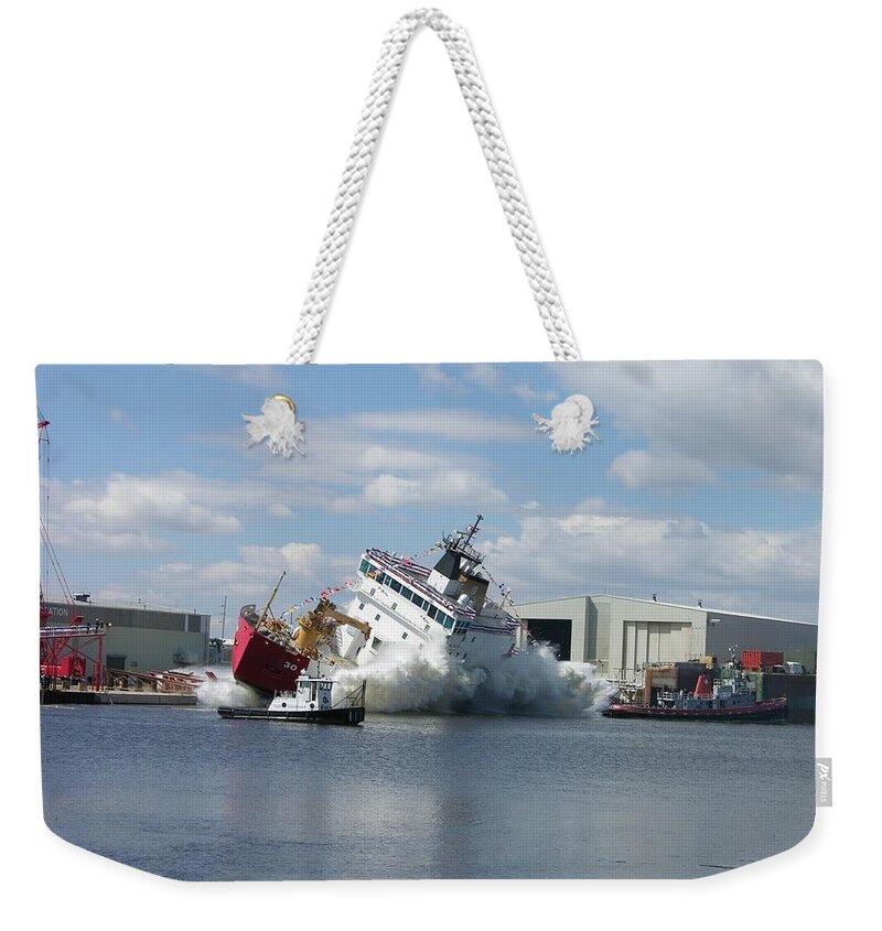 Mackinaw Weekender Tote Bag featuring the photograph Splash launch of the Coast Guard Cutter Mackinaw by Keith Stokes