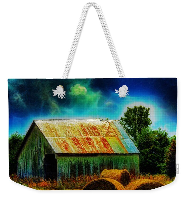 Field Weekender Tote Bag featuring the photograph Spooky Hay Field by Bill and Linda Tiepelman
