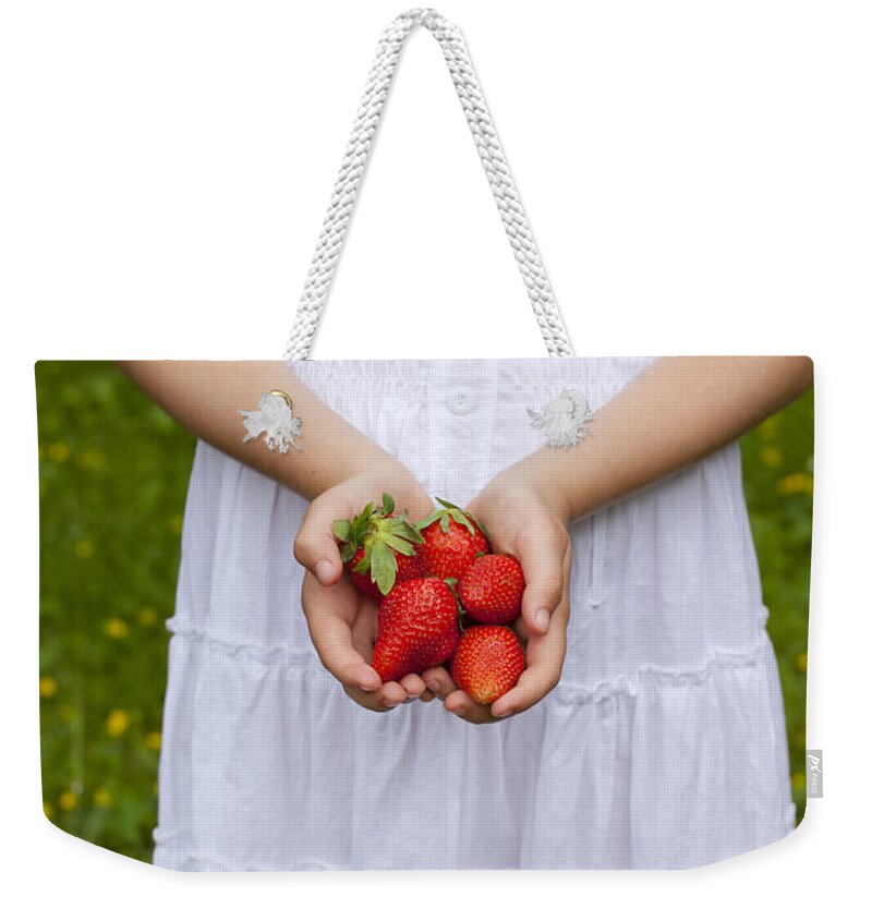 Girl Weekender Tote Bag featuring the photograph Strawberries by Joana Kruse