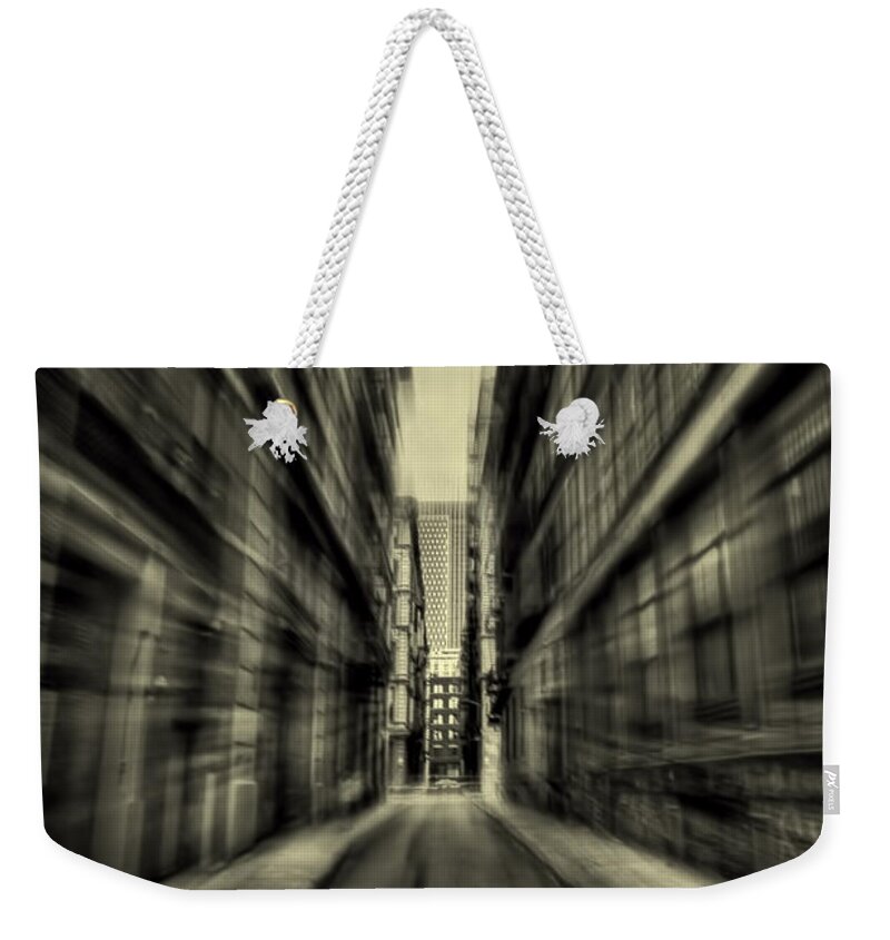 New York Weekender Tote Bag featuring the photograph Streets Of Madness by Evelina Kremsdorf
