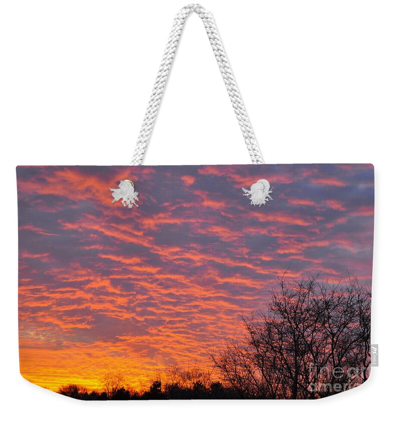 Red Sky Weekender Tote Bag featuring the photograph Sun explosion by Dejan Jovanovic