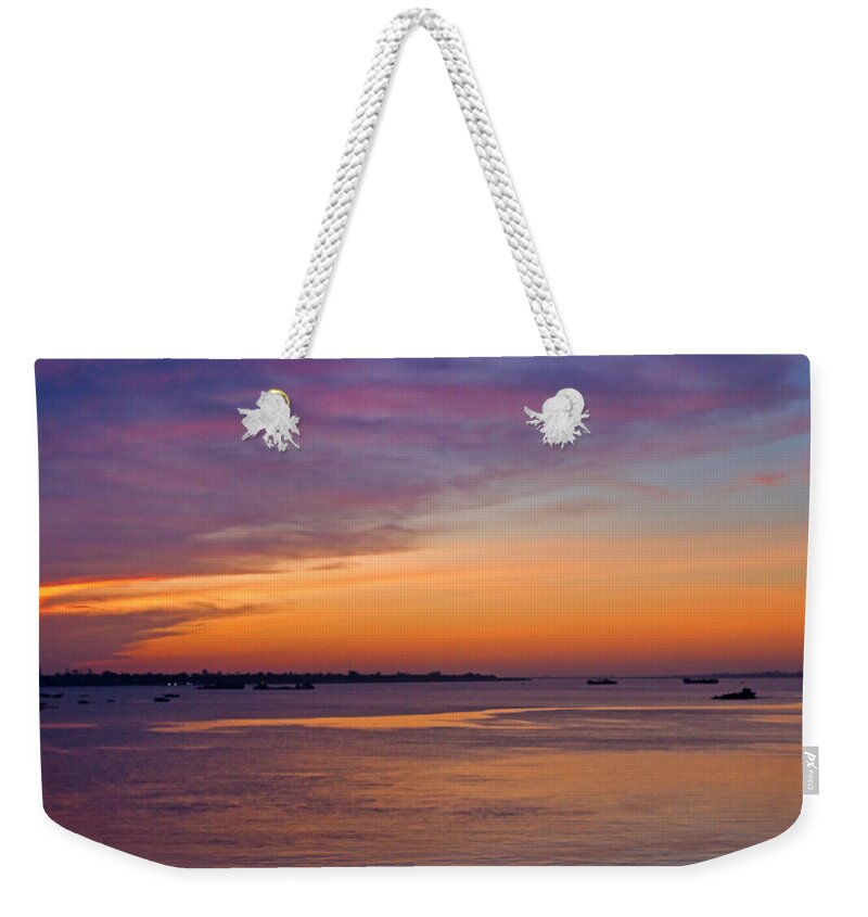 Asia Weekender Tote Bag featuring the photograph Sunrise over the Mekong. by David Freuthal