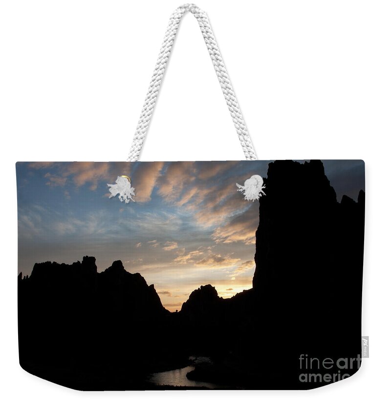 America Weekender Tote Bag featuring the photograph Sunset with Rugged Cliffs in Silhouette by Karen Lee Ensley