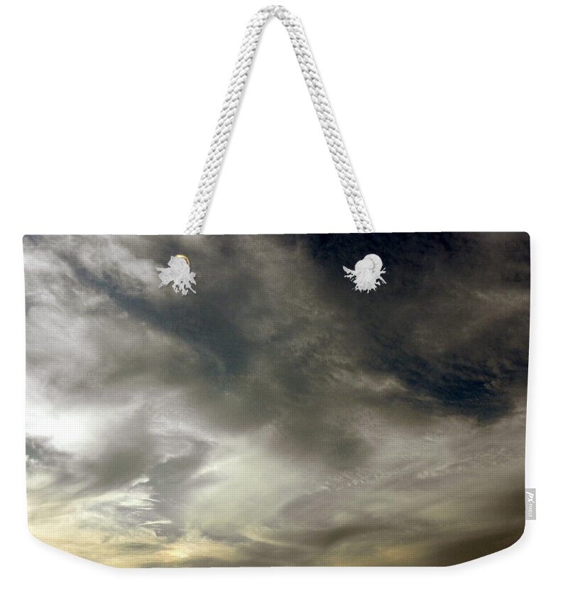 Clouds Weekender Tote Bag featuring the photograph Swirls At Sundown by Kim Galluzzo