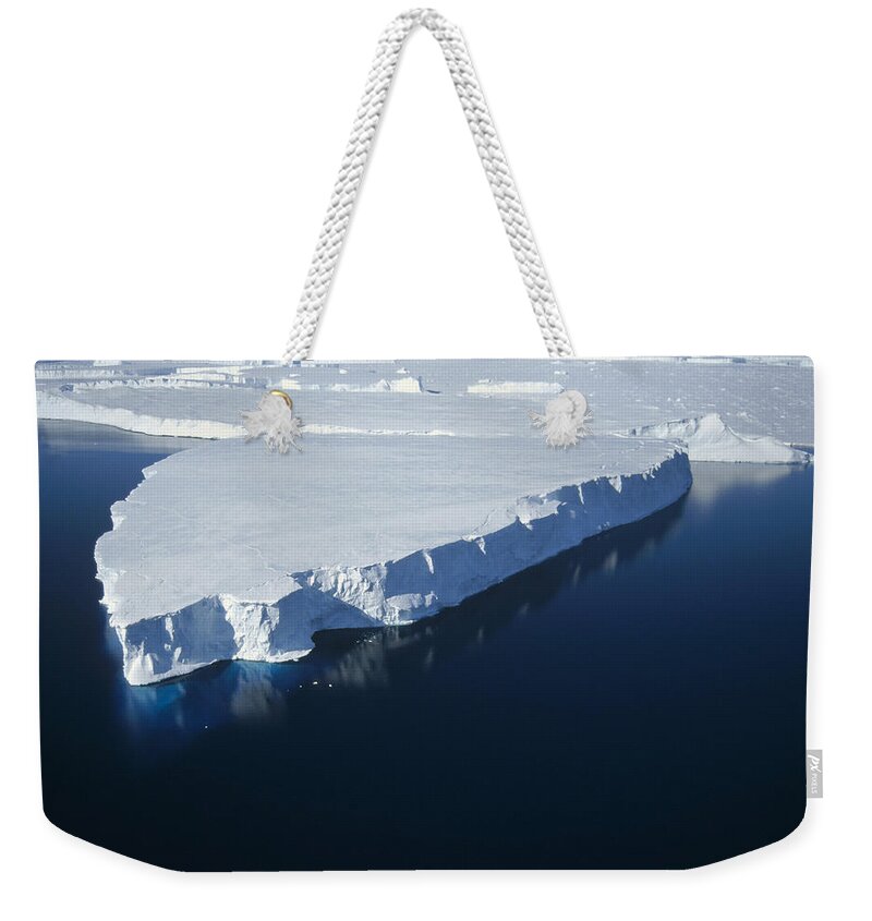 00141090 Weekender Tote Bag featuring the photograph Tabular Iceberg Along Fast Ice Edge by Tui De Roy