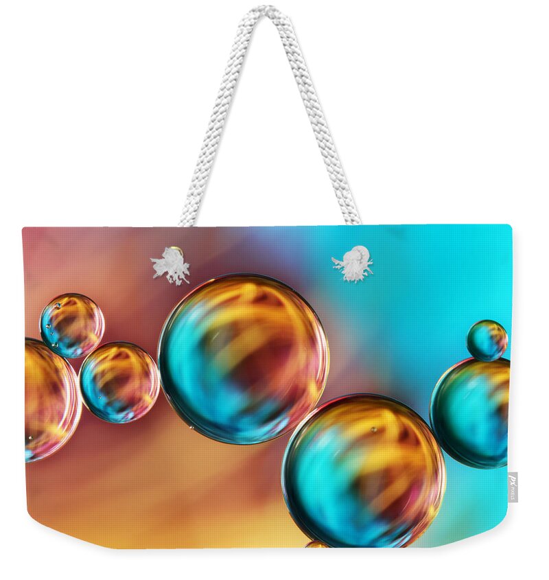 Oil Weekender Tote Bag featuring the photograph Techno-coloured Bubble Abstract by Sharon Johnstone