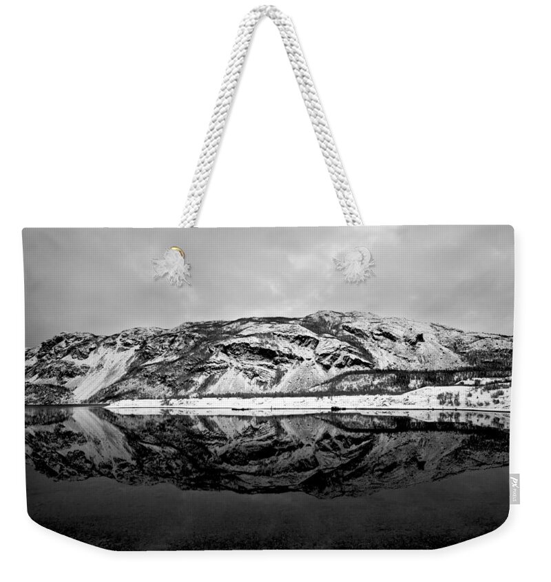 Alps Weekender Tote Bag featuring the photograph The Mountain reflection in a Fjord in Norway by U Schade