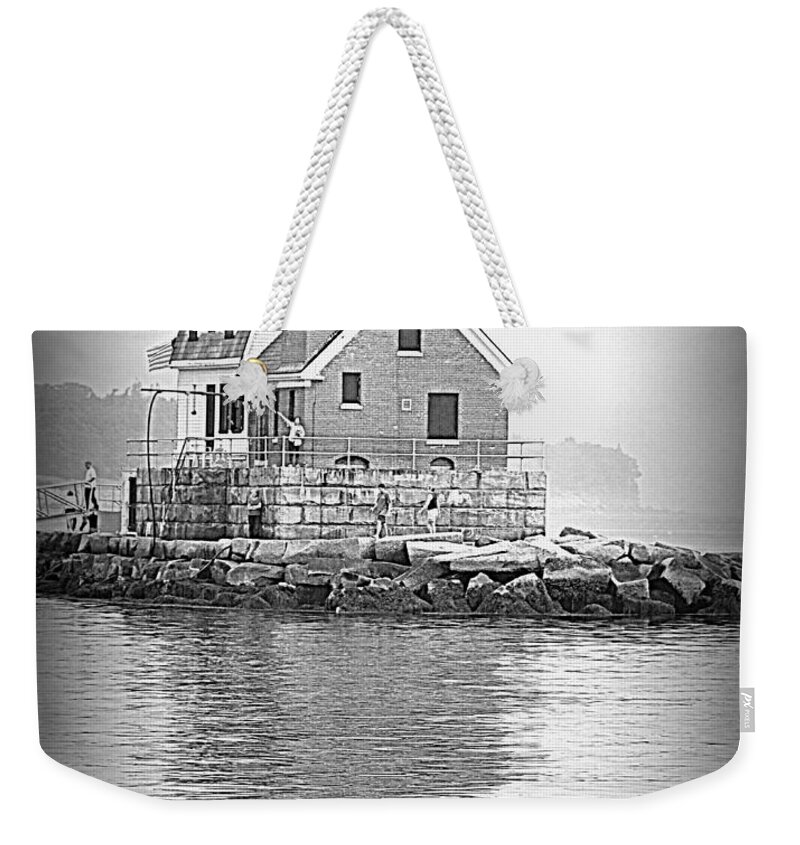 Seascape Weekender Tote Bag featuring the photograph The Rockland Breakwater Light by Doug Mills