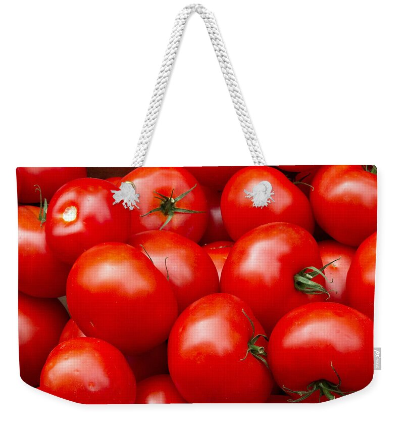 Tomato Weekender Tote Bag featuring the photograph Tomatos by David Freuthal