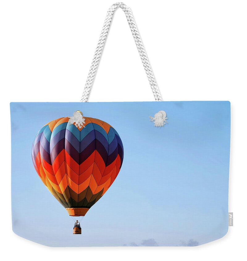Hot Weekender Tote Bag featuring the digital art Touchdown Coming Up by Gary Baird