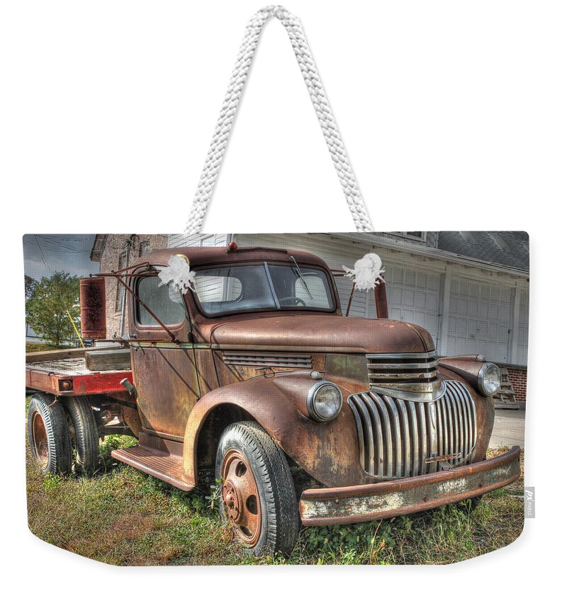 Old Weekender Tote Bag featuring the photograph Tough Old Workhorse by J Laughlin