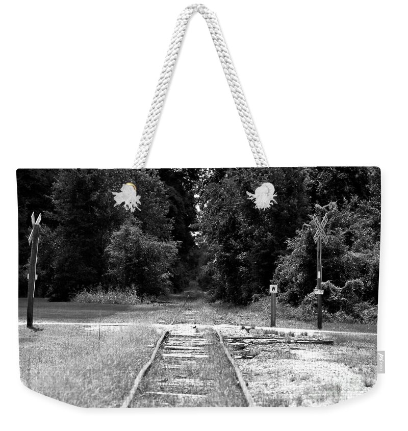 Railroad Weekender Tote Bag featuring the photograph Abandoned Rails by John Black