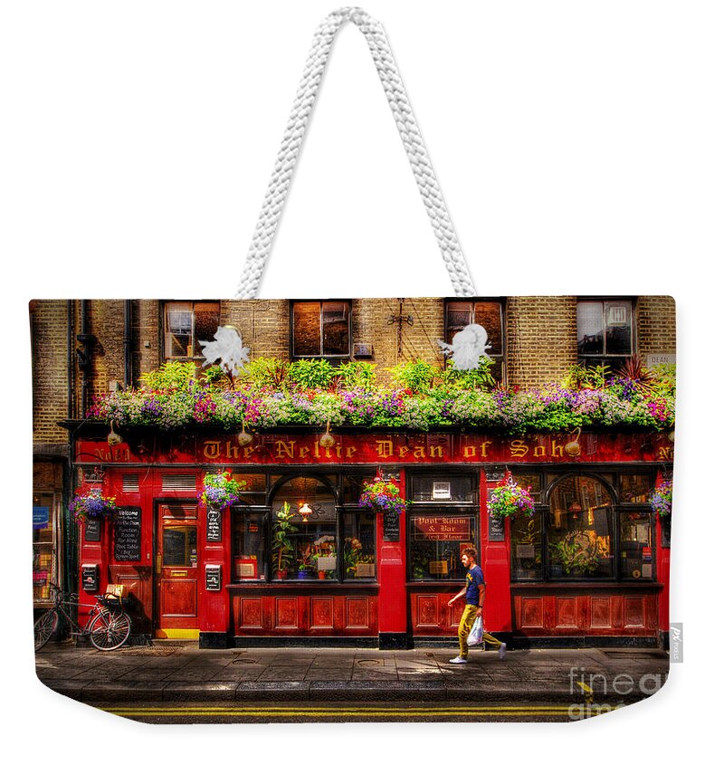 Building Weekender Tote Bag featuring the photograph Tuesday by Yhun Suarez