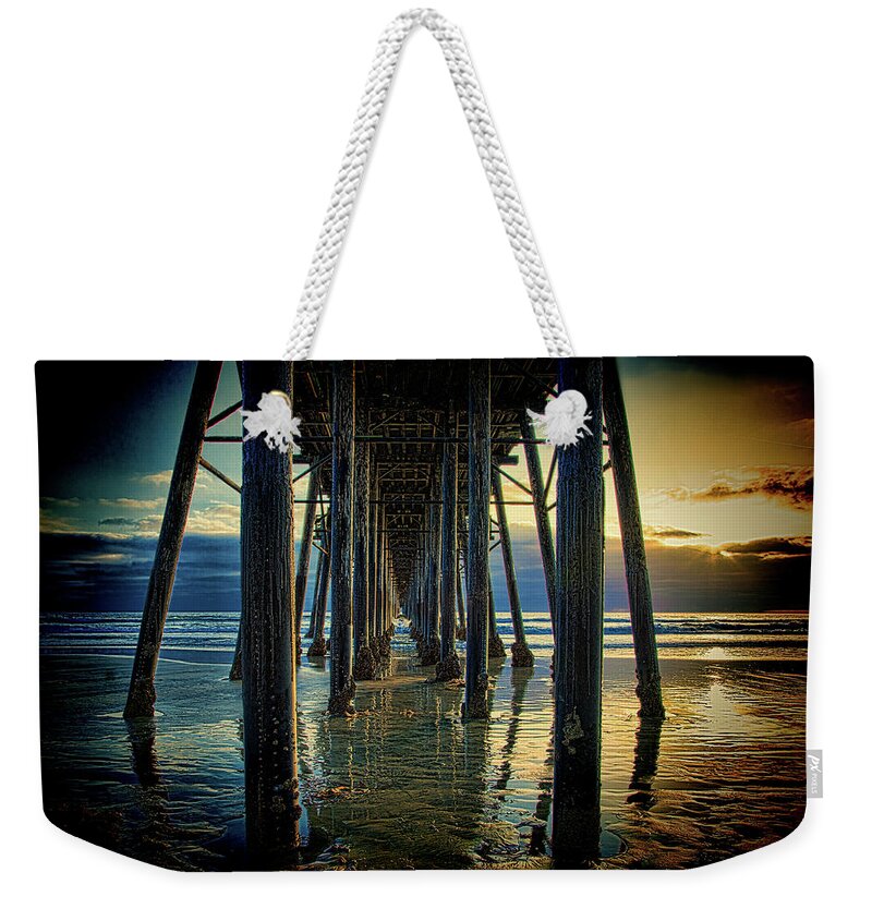 Sunset Weekender Tote Bag featuring the photograph Under the Boardwalk by Chris Lord