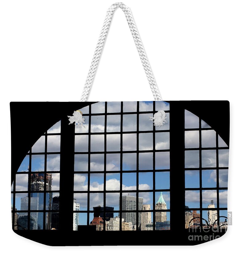 New York Weekender Tote Bag featuring the photograph View of Manhattan by Leslie Leda
