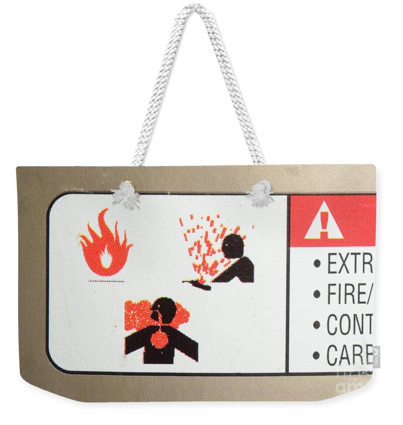 Fuel Canisters Weekender Tote Bag featuring the photograph Warning Label by Photo Researchers, Inc.