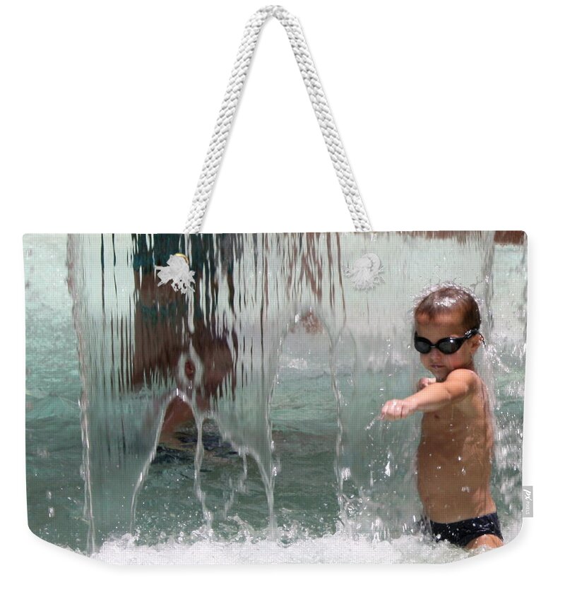 Water Weekender Tote Bag featuring the photograph Water Warrior by Farol Tomson