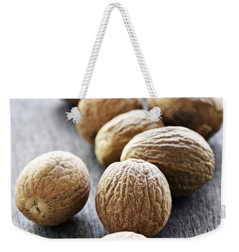 Nutmeg Weekender Tote Bag featuring the photograph Spices 7 - Nutmeg by Elena Elisseeva