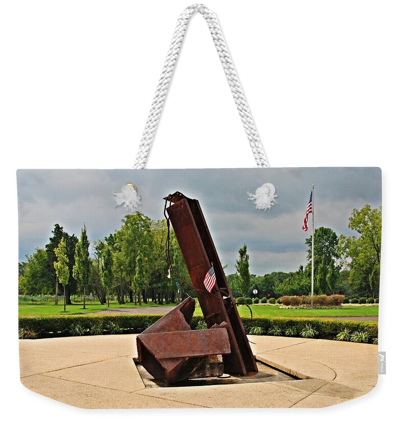 World Trade Center Weekender Tote Bag featuring the photograph World Trade Center Steel Fragments - Garden Of Reflection by Angie Tirado