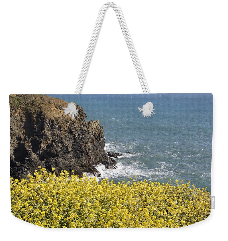 Highway 1 Weekender Tote Bag featuring the photograph Yellow Flowers on the Northern California Coast by Mick Anderson