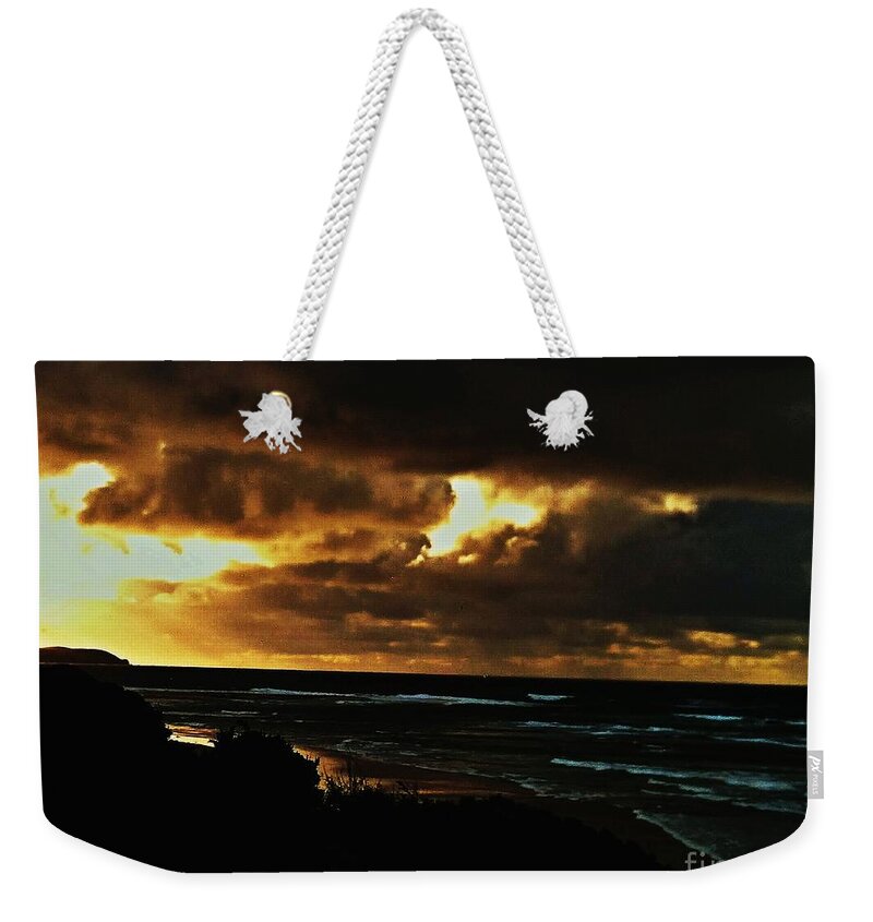 Phillip Island Weekender Tote Bag featuring the photograph A stormy Sunrise by Blair Stuart