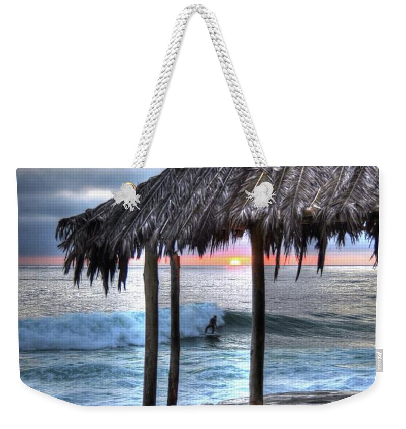 Sunset Surfing Weekender Tote Bag featuring the photograph Sunset Surfing by Kelly Wade