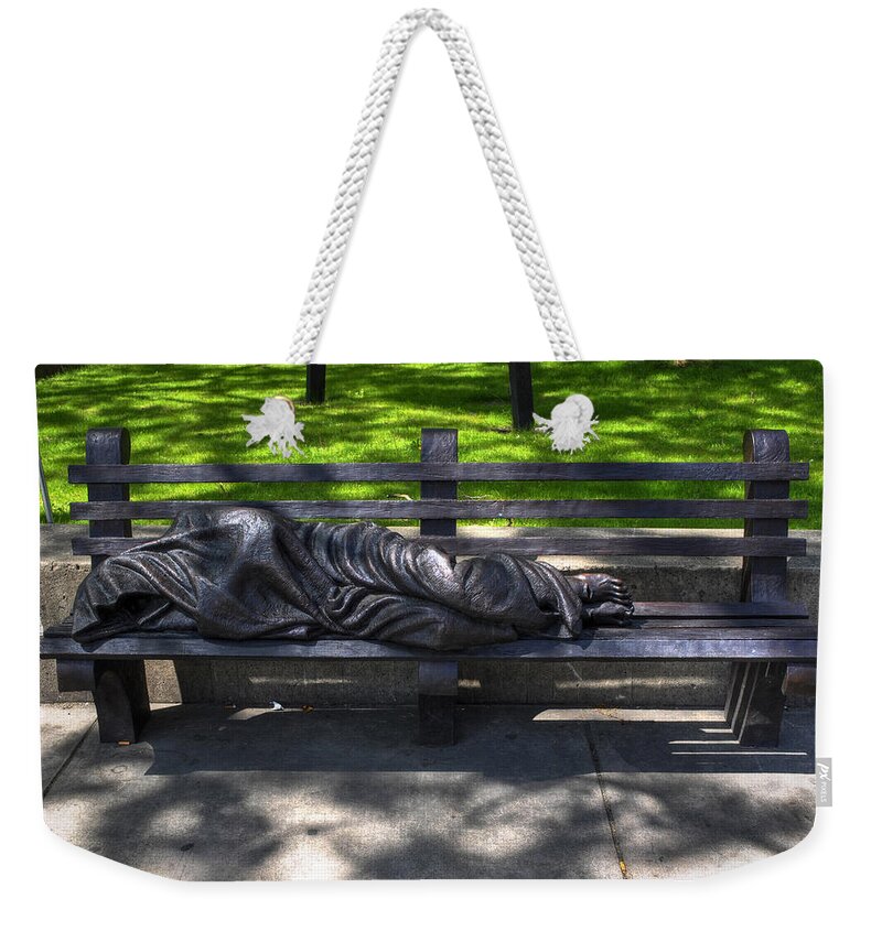 Michael Frank Jr Weekender Tote Bag featuring the photograph 02 Homeless Jesus By Timothy P Schmalz by Michael Frank Jr