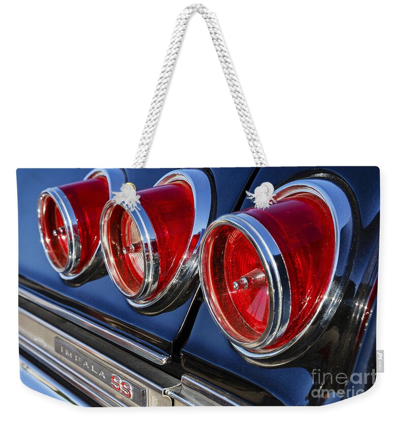 Chevrolet Weekender Tote Bag featuring the photograph 1965 Impala Super Sport by Dennis Hedberg