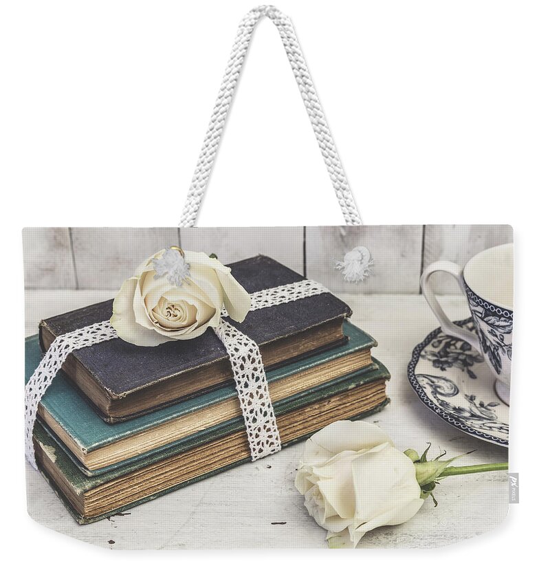 Vintage Weekender Tote Bag featuring the photograph Good Reading by Kim Hojnacki