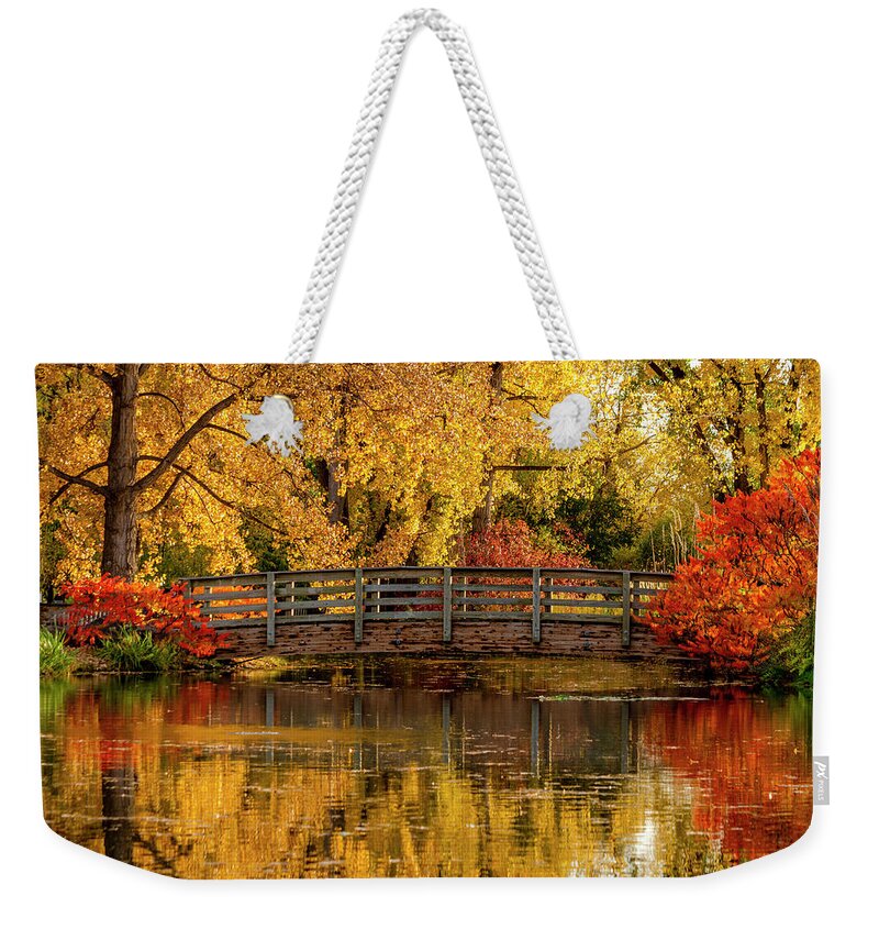 Hudson Gardens Weekender Tote Bag featuring the photograph Autumn in the Park #1 by Teri Virbickis