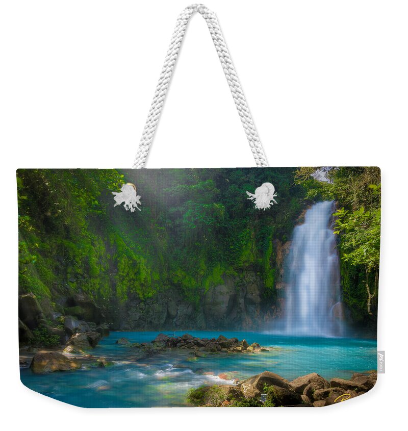 Flowing Weekender Tote Bag featuring the photograph Blue Waterfall #1 by Rikk Flohr