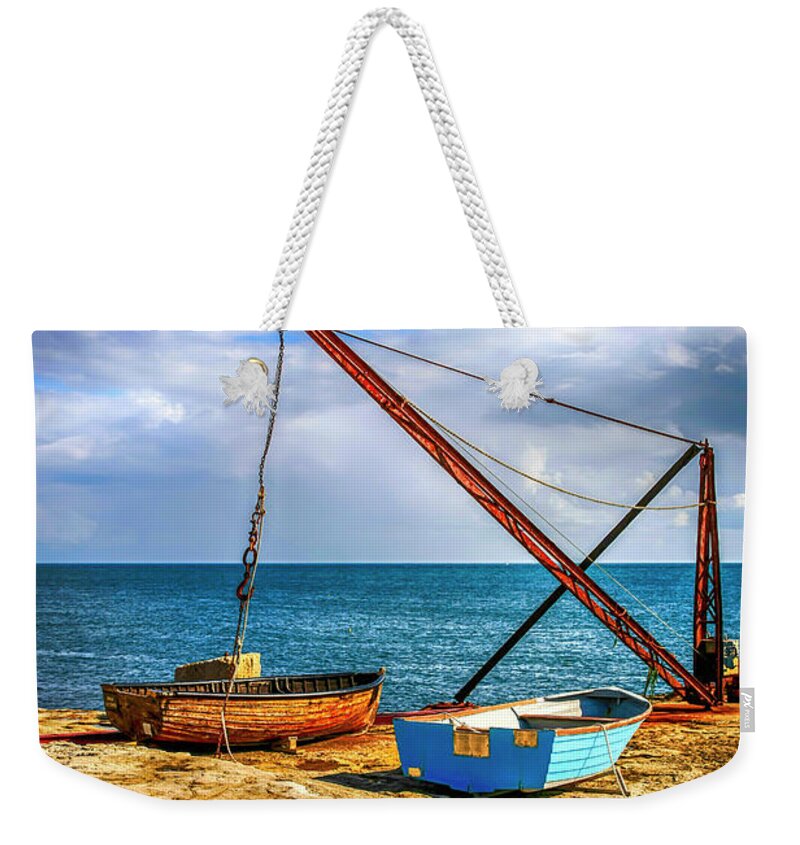 Cliffs Weekender Tote Bag featuring the photograph Boat crane at Portland UK #1 by Chris Smith