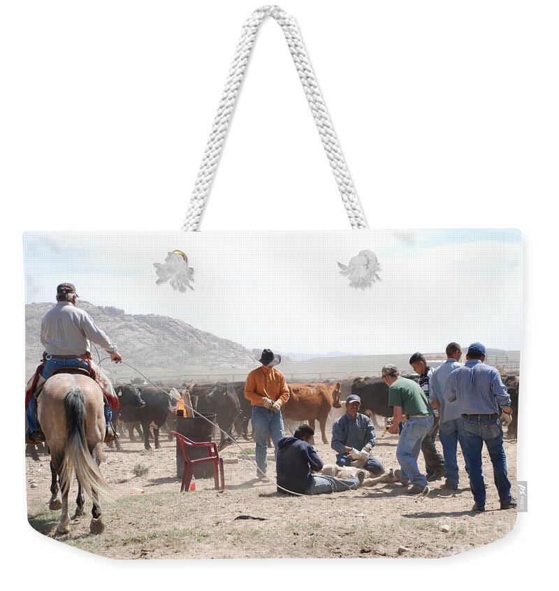 Cowboys Weekender Tote Bag featuring the photograph Branding Time by Jim Goodman