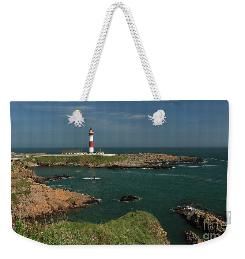 Boddam Lighthouse Weekender Tote Bag featuring the photograph Buchan Ness Lighthouse and the North Sea #1 by Maria Gaellman