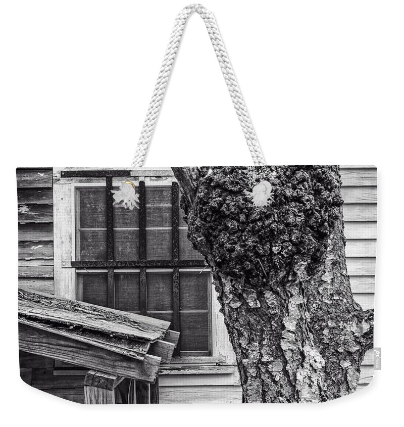 B&w Weekender Tote Bag featuring the photograph Burl and Window #1 by Frank Winters
